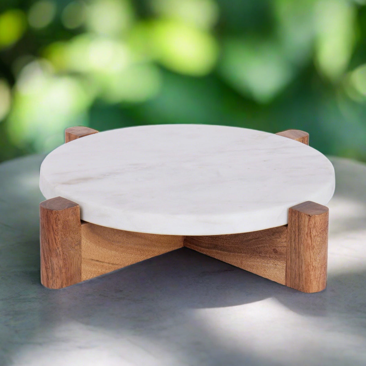 White marble cake stand with wooden base