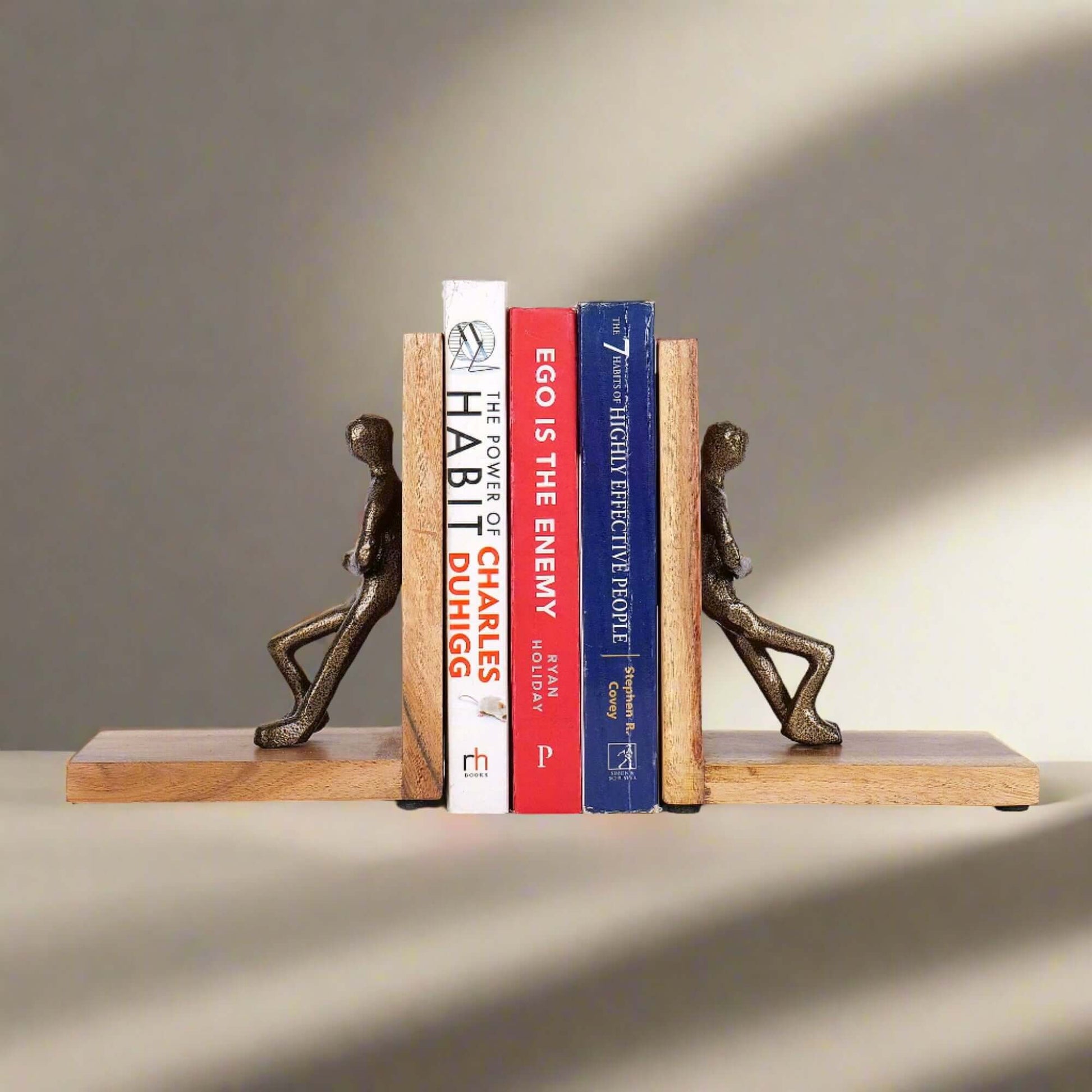Decorative bookends for holding up books on a shelf